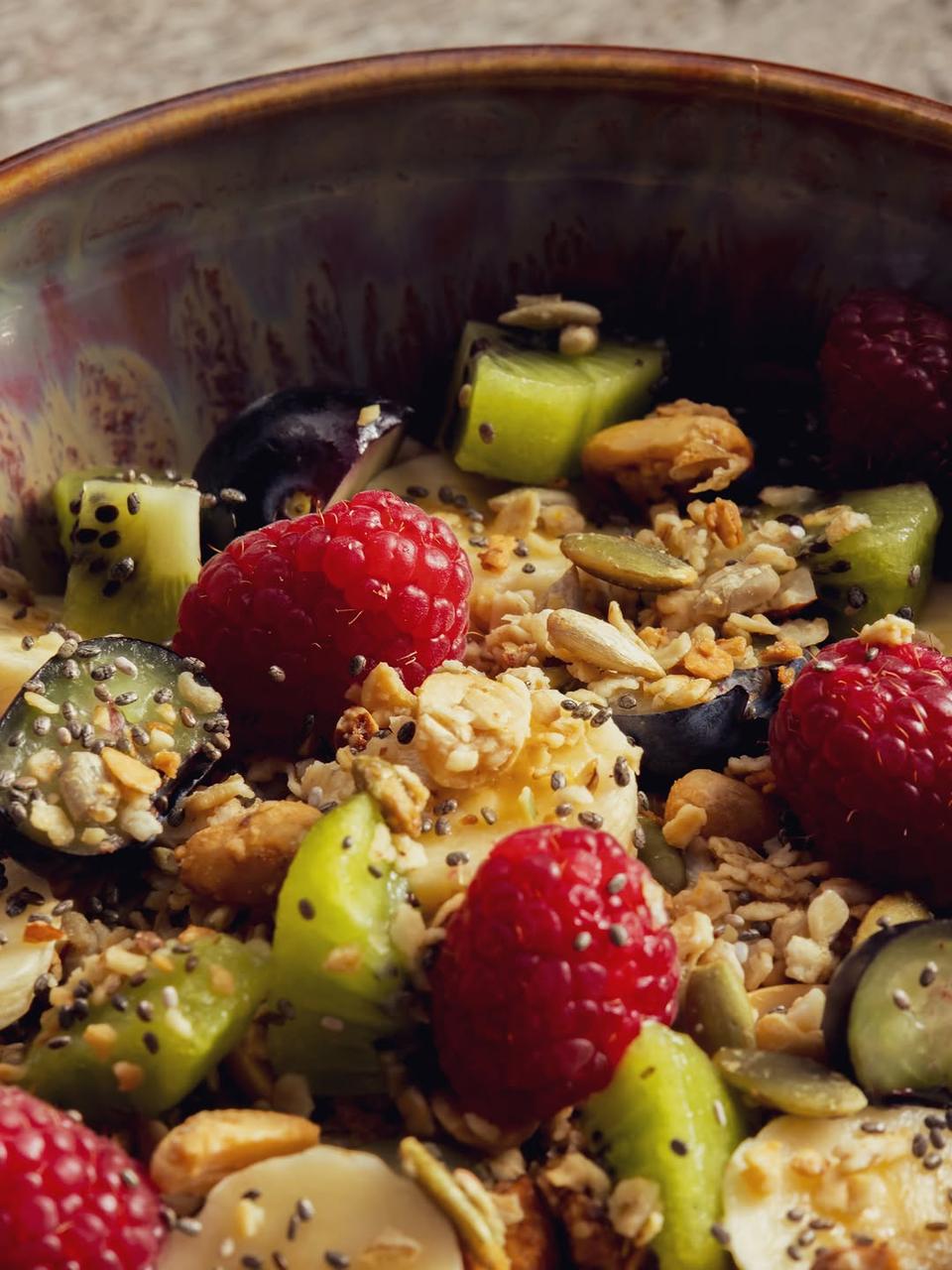 Homemade granola with yogurt sorbet and season fruits